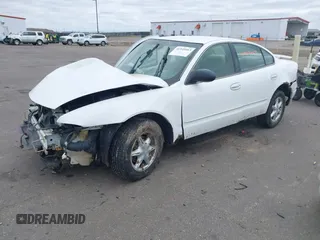 2003 Oldsmobile Alero GL1 z VIN 1G3NL52E03C256239, wystawiony jako IAAI lot #41949463 z przebiegiem 319 725 mil mil oraz . Historia ofert i sprzedaży dostępna na DreamBid. Obrazek 17.