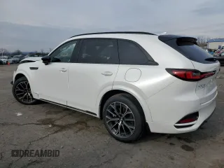 2025 Mazda CX-70 S Premium z VIN JM3KJDHC7S1106381, wystawiony jako Copart lot #83061874 z przebiegiem 783 mil mil oraz Szkody całkowita. Historia ofert i sprzedaży dostępna na DreamBid. Obrazek 2.
