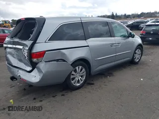 2016 Honda Odyssey EX-L with VIN 5FNRL5H64GB048004, listed as a IAAI auction lot 41676712 with 129,343 mi miles. Bid and sale history available at carsss.com. Image 4.