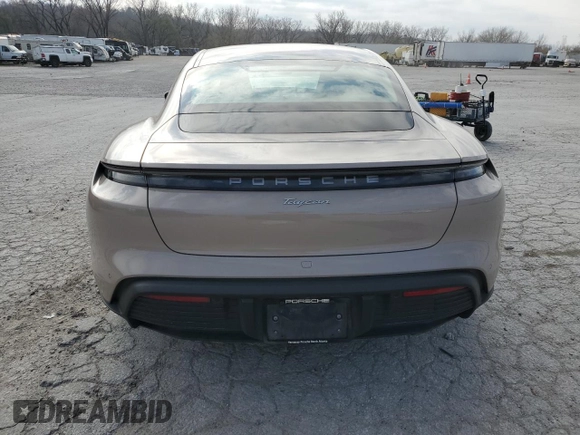 2022 Porsche Taycan z VIN WP0AA2Y10NSA13050, wystawiony jako Copart lot #82279554 z przebiegiem Nie podano mil oraz Szkoda całkowita • Salvage title. Historia ofert i sprzedaży dostępna na DreamBid. Obrazek 6.