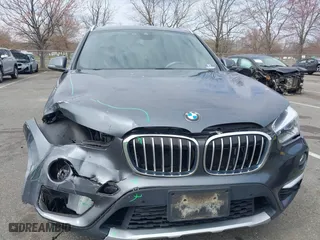 2019 BMW X1 xDrive28i with VIN WBXHT3C51K5L90571, listed as a IAAI auction lot 41909209 with 35,902 mi miles. Bid and sale history available at carsss.com. Image 17.
