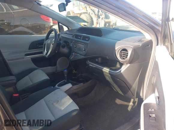 2014 Toyota Prius One with VIN JTDKDTB32E1564580, listed as a IAAI auction lot 41972541 with 186,673 mi miles and . Bid and sale history available at DreamBid. Image 5.