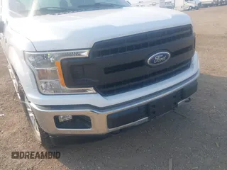 2020 Ford F-150 XL with VIN 1FTFX1E51LKF58027, listed as a IAAI auction lot 41207102 with 162,736 mi miles and . Bid and sale history available at DreamBid. Image 6.
