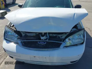 2007 Ford Focus S with VIN 1FAFP34N67W360092, listed as a IAAI auction lot 42194821 with 64,278 mi miles and . Bid and sale history available at carsss.com. Image 6.