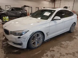 2016 BMW 3 Series GT 328i xDrive with VIN WBA8Z5C54GG500965, listed as a IAAI auction lot 41254000 with 115,672 mi miles. Bid and sale history available at carsss.com. Image 2.