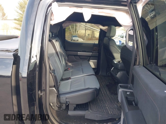 2022 Ford F-150 Lightning Pro z VIN 1FT6W1EV3NWG03970, wystawiony jako IAAI lot #41801986 z przebiegiem 29 815 mil mil oraz . Historia ofert i sprzedaży dostępna na DreamBid. Obrazek 8.