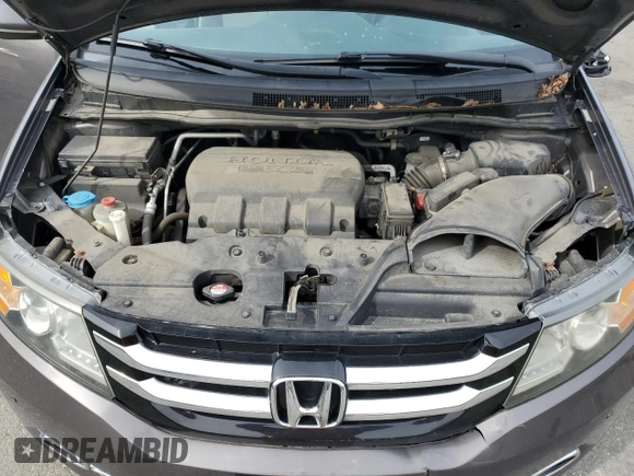 2015 Honda Odyssey Touring Elite with VIN 5FNRL5H95FB117971, listed as a Copart auction lot 52083475 with 82,626 mi miles and Salvage Title. Bid and sale history available at DreamBid. Image 12.