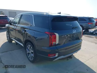 2020 Hyundai Palisade SEL z VIN KM8R34HE3LU091392, wystawiony jako IAAI lot #42185005 z przebiegiem 52 023 mil mil oraz . Historia ofert i sprzedaży dostępna na DreamBid. Obrazek 3.