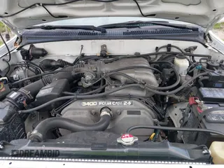 1998 Toyota 4Runner SR5 z VIN JT3GN86R5W0060650, wystawiony jako IAAI lot #42373192 z przebiegiem 264 886 mil mil oraz . Historia ofert i sprzedaży dostępna na DreamBid. Obrazek 10.