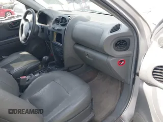 2002 Hyundai Santa Fe GLS with VIN KM8SC73D62U209998, listed as a IAAI auction lot 41915060 with 228,451 mi miles. Bid and sale history available at carsss.com. Image 5.