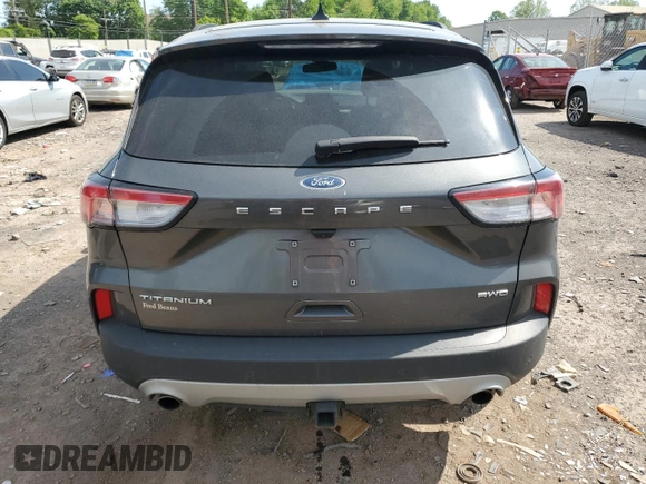 2020 Ford Escape Titanium с VIN 1FMCU9J99LUC63261, выставлен на аукционе Copart как лот 56312955 с пробегом Не указан миль и Списание • Salvage title. История ставок и продаж доступна на DreamBid. Изображение 6.
