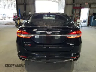 2018 Ford Fusion Titanium с VIN 3FA6P0D9XJR241506, выставлен на аукционе Copart как лот 60736525 с пробегом 109 548 миль миль и Списание • Salvage title. История ставок и продаж доступна на DreamBid. Изображение 6.