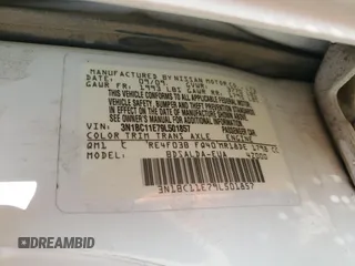 2009 Nissan Versa S z VIN 3N1BC11E79L501857, wystawiony jako Copart lot #58256025 z przebiegiem 156 313 mil mil oraz Szkoda całkowita • Salvage title. Historia ofert i sprzedaży dostępna na DreamBid. Obrazek 12.