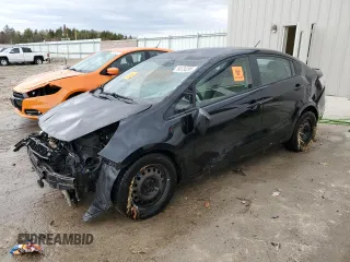2015 Kia Rio LX with VIN KNADM4A3XF6440784, listed as a Copart auction lot 54134205 with 158,035 mi miles and Non Repairable. Bid and sale history available at carsss.com. Image 1.