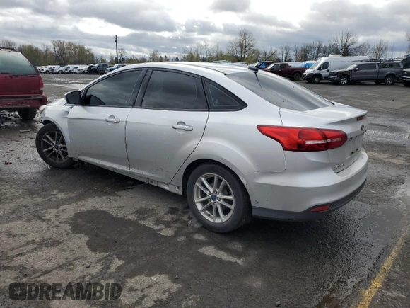 2016 Ford Focus SE with VIN 1FADP3F27GL230723, listed as a Copart auction lot 45467755 with 140,095 mi miles and Salvage title. Bid and sale history available at DreamBid. Image 2.