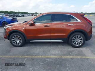 2019 Cadillac XT4 FWD Premium Luxury with VIN 1GYFZCR41KF183507, listed as a IAAI auction lot 41987176 with 64,803 mi miles and . Bid and sale history available at carsss.com. Image 14.
