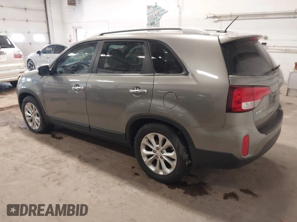 2014 Kia Sorento EX with VIN 5XYKU4A71EG435384, listed as a IAAI auction lot 41607160 with 143,622 mi miles and . Bid and sale history available at DreamBid. Image 3.