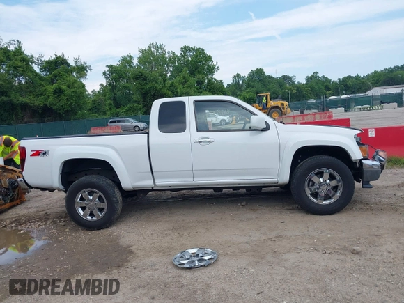 2012 Chevrolet Colorado z VIN 1GCJTDFE1C8169472, wystawiony jako IAAI lot #42393578 z przebiegiem 136 050 mil mil oraz . Historia ofert i sprzedaży dostępna na DreamBid. Obrazek 14.