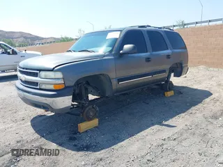 2001 Chevrolet Tahoe LS z VIN 1GNEC13T51J153677, wystawiony jako IAAI lot #42459552 z przebiegiem 201 209 mil mil oraz . Historia ofert i sprzedaży dostępna na DreamBid. Obrazek 17.