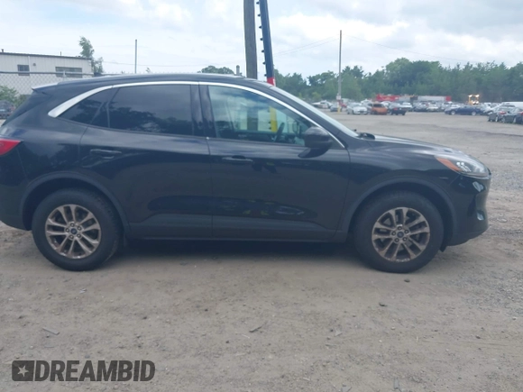 2021 Ford Escape SE with VIN 1FMCU9G60MUA38130, listed as a IAAI auction lot 42763003 with 98,388 mi miles and . Bid and sale history available at DreamBid. Image 12.