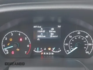2022 Ford Transit Cargo z VIN 1FTBF4UG4NKA60882, wystawiony jako IAAI lot #42255992 z przebiegiem 2 977 mil mil oraz . Historia ofert i sprzedaży dostępna na DreamBid. Obrazek 7.