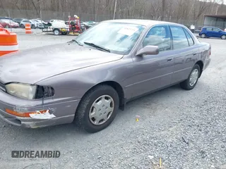 1994 Toyota Camry LE z VIN 4T1SK12E0RU463582, wystawiony jako IAAI lot #41823733 z przebiegiem 120 050 mil mil oraz . Historia ofert i sprzedaży dostępna na DreamBid. Obrazek 2.