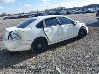 2013 Chevrolet Impala Police with VIN 2G1WD5E34D1265263, listed as a IAAI auction lot 41115415 with 191,679 mi miles. Bid and sale history available at carsss.com. Image 4.