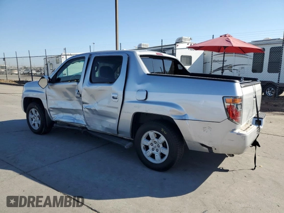 2007 Honda Ridgeline RTL w/Leather with VIN 2HJYK16567H539309, listed as a Copart auction lot 73769974 with 173,499 mi miles and Salvage Title. Bid and sale history available at carsss.com. Image 2.