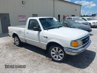 1997 Ford Ranger XLT z VIN 1FTCR10A3VPA01711, wystawiony jako IAAI lot #42811358 z przebiegiem 256 077 mil mil oraz . Historia ofert i sprzedaży dostępna na DreamBid. Obrazek 1.