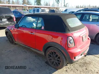 2013 MINI Convertible S with VIN WMWZP3C55DT705938, listed as a IAAI auction lot 41372294 with 118,481 mi miles and . Bid and sale history available at DreamBid. Image 3.