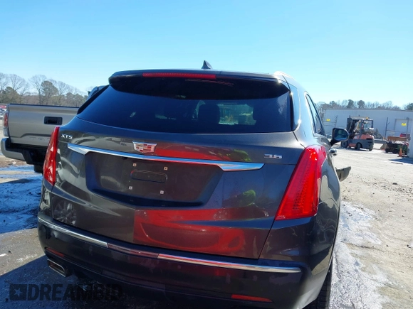 2019 Cadillac XT5 Premium Luxury FWD with VIN 1GYKNERS7KZ145993, listed as a IAAI auction lot 41619112 with 81,435 mi miles and . Bid and sale history available at DreamBid. Image 17.
