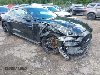 2020 Ford Mustang GT z VIN 1FA6P8CF3L5168510, wystawiony jako IAAI lot #42206570 z przebiegiem 34 418 mil mil oraz . Historia ofert i sprzedaży dostępna na DreamBid. Obrazek 1.