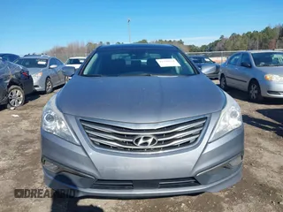 2016 Hyundai Azera Limited z VIN KMHFH4JGXGA568911, wystawiony jako IAAI lot #41428434 z przebiegiem 158 202 mil mil oraz . Historia ofert i sprzedaży dostępna na DreamBid. Obrazek 11.