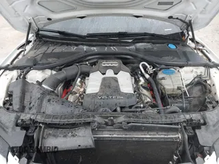 2014 Audi A7 Premium Plus z VIN WAUWGAFC0EN083417, wystawiony jako IAAI lot #41350273 z przebiegiem 163 402 mil mil oraz . Historia ofert i sprzedaży dostępna na DreamBid. Obrazek 10.