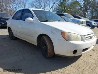 2004 Kia Spectra LX with VIN KNAFE121745036331, listed as a IAAI auction lot 41735613 with 67,634 mi miles. Bid and sale history available at carsss.com. Image 1.