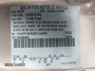 1999 Ford Escort LX with VIN 1FAFP10PXXW136402, listed as a IAAI auction lot 41375841 with 151,699 mi miles. Bid and sale history available at carsss.com. Image 9.