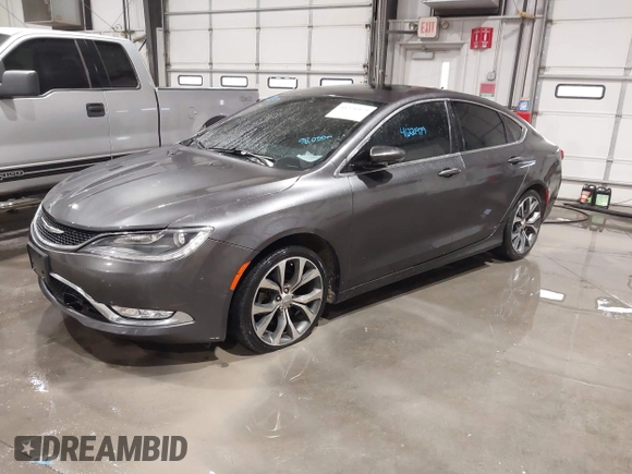 2015 Chrysler 200 C with VIN 1C3CCCCG1FN551259, listed as a IAAI auction lot 41221979 with 98,055 mi miles and . Bid and sale history available at carsss.com. Image 2.