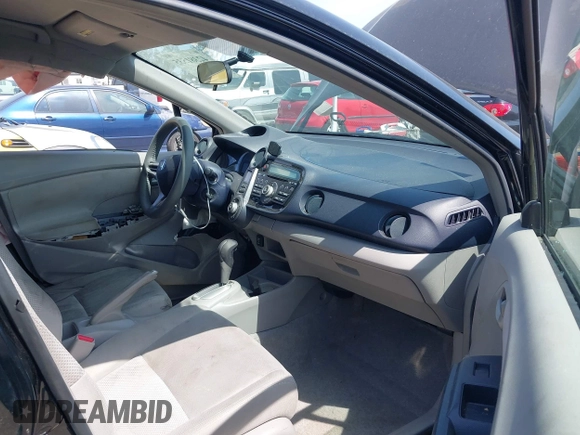 2010 Honda Insight LX with VIN JHMZE2H50AS014165, listed as a IAAI auction lot 42381535 with 169,032 mi miles and . Bid and sale history available at DreamBid. Image 5.