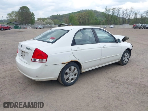 2009 Kia Spectra EX with VIN KNAFE221195609687, listed as a IAAI auction lot 42138825 with 105,170 mi miles. Bid and sale history available at carsss.com. Image 4.