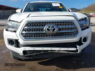 2017 Toyota Tacoma SR5 with VIN 3TMCZ5AN8HM063513, listed as a IAAI auction lot 40703177 with 42,323 mi miles and . Bid and sale history available at carsss.com. Image 6.