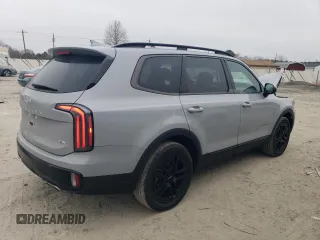2024 Kia Telluride EX X-Line z VIN 5XYP3DGC0RG557043, wystawiony jako Copart lot #48745215 z przebiegiem 8 768 mil mil oraz Szkoda całkowita • Salvage title. Historia ofert i sprzedaży dostępna na DreamBid. Obrazek 3.