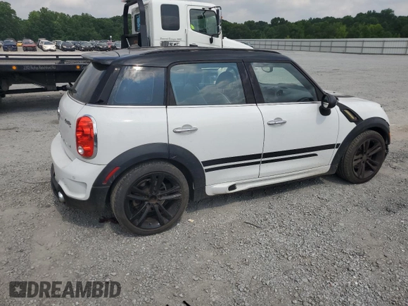 2014 MINI Countryman S with VIN WMWZC3C53EWP27156, listed as a Copart auction lot 59579765 with 159,308 mi miles and Salvage title. Bid and sale history available at DreamBid. Image 3.