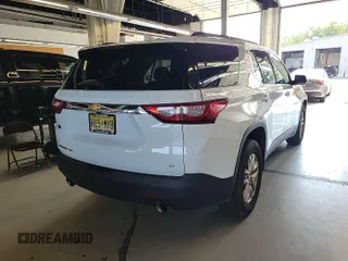 2020 Chevrolet Traverse LT Cloth z VIN 1GNEVMKW4LJ292564, wystawiony jako IAAI lot #42866891 z przebiegiem 72 750 mil mil oraz . Historia ofert i sprzedaży dostępna na DreamBid. Obrazek 20.