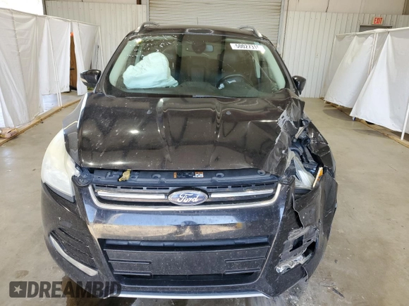 2016 Ford Escape Titanium with VIN 1FMCU0J91GUB09161, listed as a Copart auction lot 50027315 with 106,784 mi miles and Salvage Title. Bid and sale history available at carsss.com. Image 5.