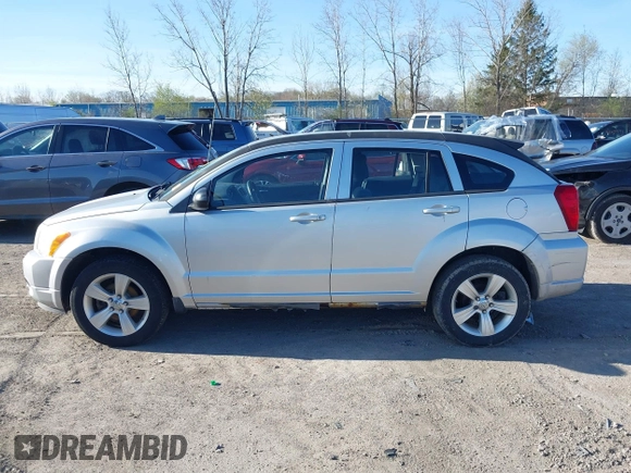 2012 Dodge Caliber SXT with VIN 1C3CDWDAXCD508338, listed as a IAAI auction lot 42091675 with 213,596 mi miles and . Bid and sale history available at DreamBid. Image 14.