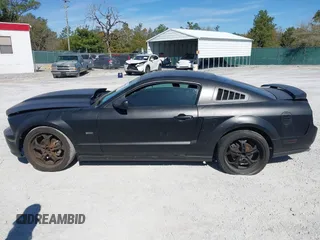 2005 Ford Mustang Deluxe with VIN 1ZVFT80N655136118, listed as a IAAI auction lot 41811969 with 104,071 mi miles. Bid and sale history available at carsss.com. Image 14.