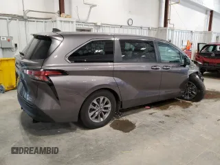 2021 Toyota Sienna XLE с VIN 5TDYSKFC8MS012409, выставлен на аукционе Copart как лот 57870055 с пробегом 82 107 миль миль и Списание • Salvage title. История ставок и продаж доступна на DreamBid. Изображение 3.