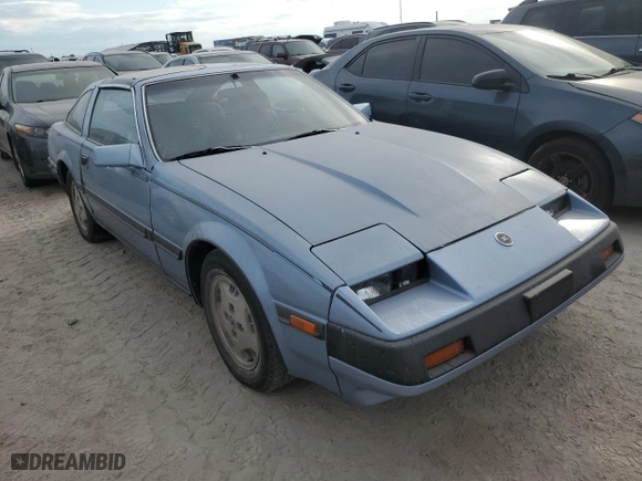 1985 Nissan 300ZX with VIN JN1HZ16S2FX056662, listed as a Copart auction lot 76184674 with NaN miles and Salvage Title. Bid and sale history available at carsss.com. Image 4.