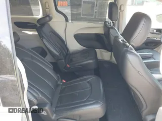 2022 Chrysler Pacifica Touring L with VIN 2C4RC1BG3NR168565, listed as a IAAI auction lot 42150290 with 61,750 mi miles and . Bid and sale history available at DreamBid. Image 8.