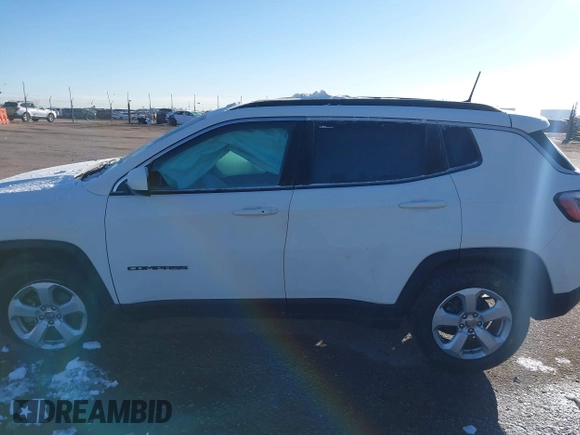 2019 Jeep Compass Latitude with VIN 3C4NJDBB5KT704564, listed as a IAAI auction lot 40768531 with 95,291 mi miles. Bid and sale history available at carsss.com. Image 14.